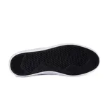 Championes urbanos Converse Net Star OX, color gris con detalles en blanco y negro.