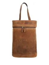 Mochila matera de cuero 100% natural color tostado, de diseño convertible con sistema ajustable para usar como mochila o bolso de hombro. Cuenta con compartimento principal con cierre, asa superior y detalles de la marca grabados en bajorrelieve.