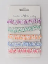 Set de cinco colitas de pelo con elástico, de tela estampada a cuadros en colores pastel: lila, verde, naranja, celeste y rosa.