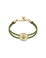 Pulsera de cuero verde con doble tira, dije central dorado con forma de ojo y cristal verde.