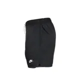 Short de baño Nike color negro, con cintura elástica ajustable mediante cordón blanco y logo de la marca bordado en la parte inferior de la pierna.