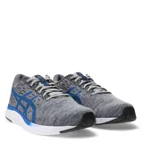 Championes Asics Streetwise grises con logo plateado, cordones negros y suela blanca.