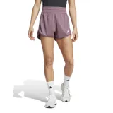 Short deportivo Adidas Pacer Essentials color lila, con cintura elástica, logo estampado en el ruedo y tecnología Aeroready.