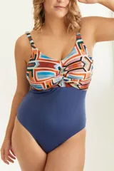 Malla entera azul con estampado geométrico multicolor en la parte superior, escote cruzado y breteles finos regulables.