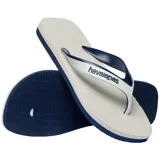 Sandalias de dedo Havaianas modelo Dual, color blanco con tiras en azul marino y blanco que presentan el logo de la marca en relieve.