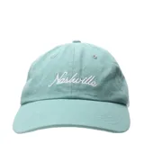 Gorro tipo cap color celeste con bordado frontal en hilo blanco con la palabra Nashville.