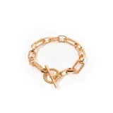 Pulsera dorada con eslabones gruesos y cierre tipo toggle.