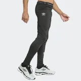 Calza térmica deportiva de ajuste ceñido, color azul marino, con cintura elástica con logo de la marca y logo estampado en la pierna izquierda.