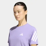 Remera de running Adidas modelo Adi365 Climacool de color lila, con cuello redondo y mangas cortas adornadas con las tres tiras blancas características de la marca. Incluye el logo de Adidas en el pecho en color blanco y tecnología Climacool para absorción del sudor.