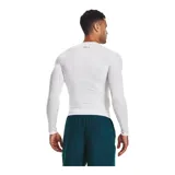 Remera deportiva blanca de manga larga Under Armour HeatGear®, con paneles de malla en axilas y espalda para ventilación, costuras ergonómicas y construcción híbrida de manga raglán para mayor rango de movimiento.