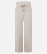 Pantalón wide leg de punto con textura acanalada, cintura elástica con lazo ajustable y detalles metalizados, y frisos verticales a lo largo de la pierna.