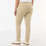 Pantalón skinny de tiro alto color beige, confeccionado en denim elástico, con bolsillos delanteros y traseros.
