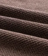 Su&eacute;ter de tricot liviano de algod&oacute;n con efecto marmolado, cuello polo con botones, mangas largas y terminaciones acanaladas.