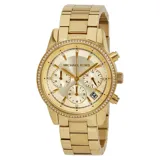 Reloj analógico Michael Kors modelo Bryant, con caja y malla de acero inoxidable en tono dorado. Presenta una esfera dorada con subesferas de cronógrafo, indicador de fecha y bisel decorado con cristales brillantes.