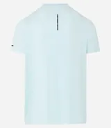 Remera deportiva de hombre con tecnología dry fit, cuello redondo y manga corta. Presenta un diseño liso en color beige con una pequeña etiqueta decorativa en el dobladillo.