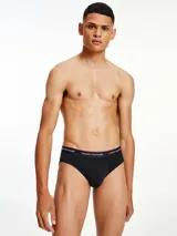 Pack de tres slips negros de algodón elástico con cintura elástica con logo Tommy Hilfiger.