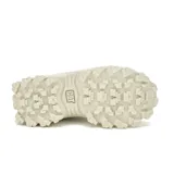 Championes Caterpillar modelo Intruder Lite, color blanco con detalles en celeste, con suela chunky de goma gruesa y plataforma.