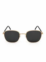 Lentes de sol Galatea con armazón metálico dorado de formato cuadrado y patillas negras.