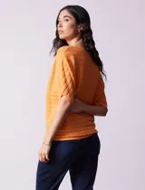 Buzo azul de tejido acanalado marca Ninety, con mangas cortas japonesas.