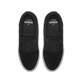 Championes de skate Emerica modelo The Hoban, color negro con detalles en verde y suela blanca. Presentan un diseño de perfil bajo con costuras reforzadas en la puntera y ojal superior metálico dorado.