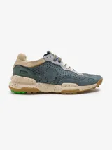 Championes Satorisan modelo Chacrona Laser Prem., color gris con detalles en verde, beige y suela moteada.