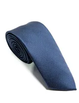 Corbata de seda azul marino con estampado paisley en tonos rosados y blancos.