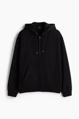 Campera con capucha en felpa de peso medio con interior cepillado suave. Modelo de hombros caídos con capucha y cordón para ajustar, cierre frontal y bolsillos delanteros. Puños y bajo en punto acanalado.