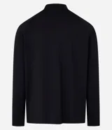 Remera deportiva térmica de hombre, color azul melange, de manga larga con corte raglán, cuello alto y cierre frontal parcial.