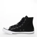 Championes de caña alta Converse Chuck Taylor, color negro con textura granulada, puntera de goma blanca y suela de goma con franja negra.