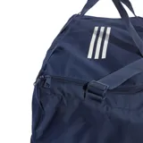 Bolso Adidas Tiro League azul marino con base negra y logo blanco. Tiene doble asa de mano, correa de hombro ajustable, compartimento principal con cierre en forma de U, bolsillo lateral de malla y compartimento inferior rígido.