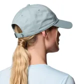 Gorra de béisbol Columbia de color verde menta, con diseño clásico de visera curva, cierre posterior ajustable y el logotipo de la marca bordado en tono azul en el panel frontal.