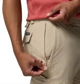 Pantalón cargo Columbia Roc Tech para hombre, color beige, con bolsillos laterales y traseros, tecnología de repelencia Omni-Shield y tejido elástico.