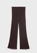 Pantalón de tiro medio confeccionado en tejido de punto calado, con diseño recto y largo. Cuenta con cintura elástica y forro interior.