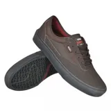 Zapatillas Vans Skate Curren Caples color marrón con detalles en rojo.