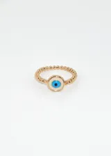 Anillo dorado con banda de esferas y dije circular con diseño de ojo turco.