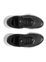Championes de entrenamiento Under Armour Project Rock BSR 5, color negro con suela blanca. Presentan una parte superior de malla transpirable con refuerzos sintéticos, mediasuela Charged Cushioning para amortiguación reactiva y tecnología UA TriBase para mayor estabilidad y contacto con el suelo.