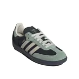 Championes Adidas Samba Og W, color negro con detalles en verde y beige.