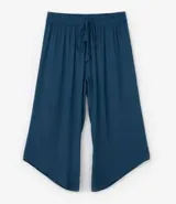 Pantalón pantacourt azul petróleo, de viscosa, con cintura elástica y lazo decorativo con borlas.