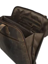 Cartera tipo tote bag marca RKF, confeccionada en cuero 100% natural color marrón con diseño grabado de hojas y ramas en relieve. Cuenta con doble asa de hombro del mismo material, cierre superior y un discreto logotipo grabado en la parte frontal.