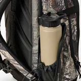 Mochila Rip Curl línea F-Light con capacidad de 35 litros, diseñada con estampado camuflado en tonos verdes, marrones y beige. Cuenta con múltiples compartimentos con cierre, correas de ajuste laterales y una base reforzada en color negro.
