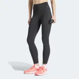 Calzas largas Adidas Optime Workout Contour de color negro, diseñadas para entrenamiento con ajuste ceñido, tiro súper alto y bolsillos en los muslos.