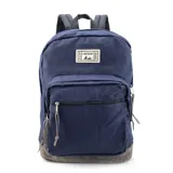 Mochila de tela Oxford azul con base de nobuk, cuenta con un compartimento principal amplio y un bolsillo frontal con cierre. Incluye correas de hombro acolchadas y tiradores de cierre en cuero.