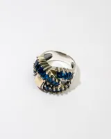 Anillo de plata 925 con dublé de oro y circonias azules.