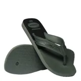 Sandalias tipo ojota Havaianas modelo City Basic, con base en color verde oliva y tiras a tono con textura grabada. Presentan una plantilla con diseño antideslizante y logo de la marca en relieve.
