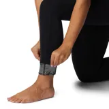 Calza térmica deportiva de mujer Columbia modelo Midweit Stretch T Omni-Heat, color negro, de tiro medio y ajuste ceñido con cintura elástica.