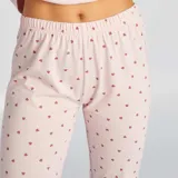 Pijama largo de dos piezas color rosa, con estampado de Pitufina y corazones.