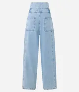 Pantalón clochard de jeans celeste, con cintura alta ajustable con lazo, bolsillos delanteros y traseros.
