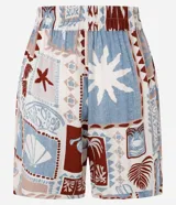 Short de cintura alta confeccionado en viscosa estampada con motivos tropicales. Tiene elástico y lazo en la cintura.