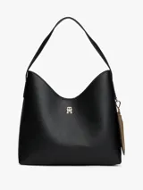 Cartera de hombro Tommy Hilfiger con silueta semiestructurada y acabado granulado. Presenta un diseño minimalista con el monograma TH metálico en el frente, asa superior fija y cierre de botón a presión. Incluye un monedero extraíble a contraste en el lateral.