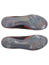 Championes de fútbol Under Armour Shadow Elite 3 FG, con parte superior de tejido IntelliKnit negro y naranja, diseño ergonómico y suela de fibra de carbono para máxima aceleración.
